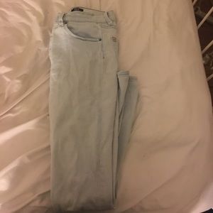 BDG light wash, button up skinny jeans. Size 30